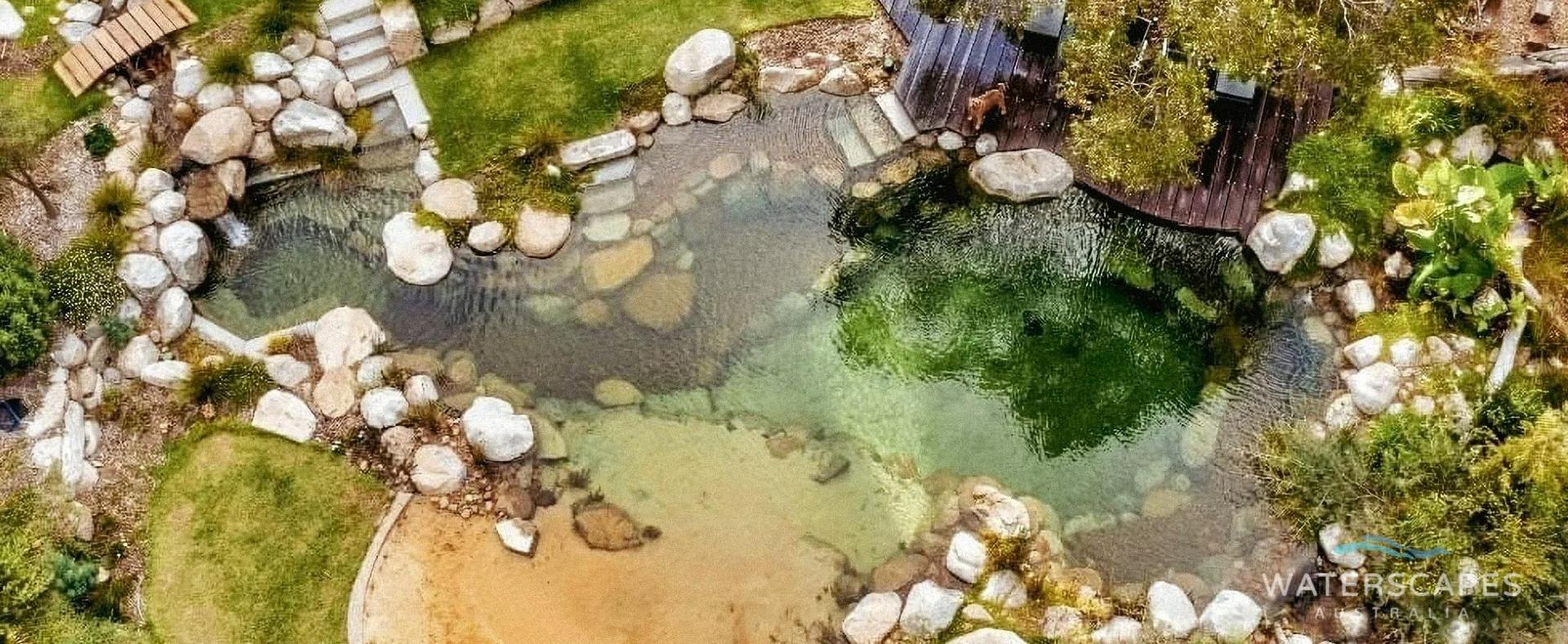 A natural swimming pond seen from above