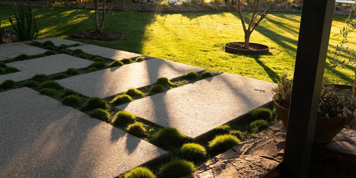 a back garden after landscaping services